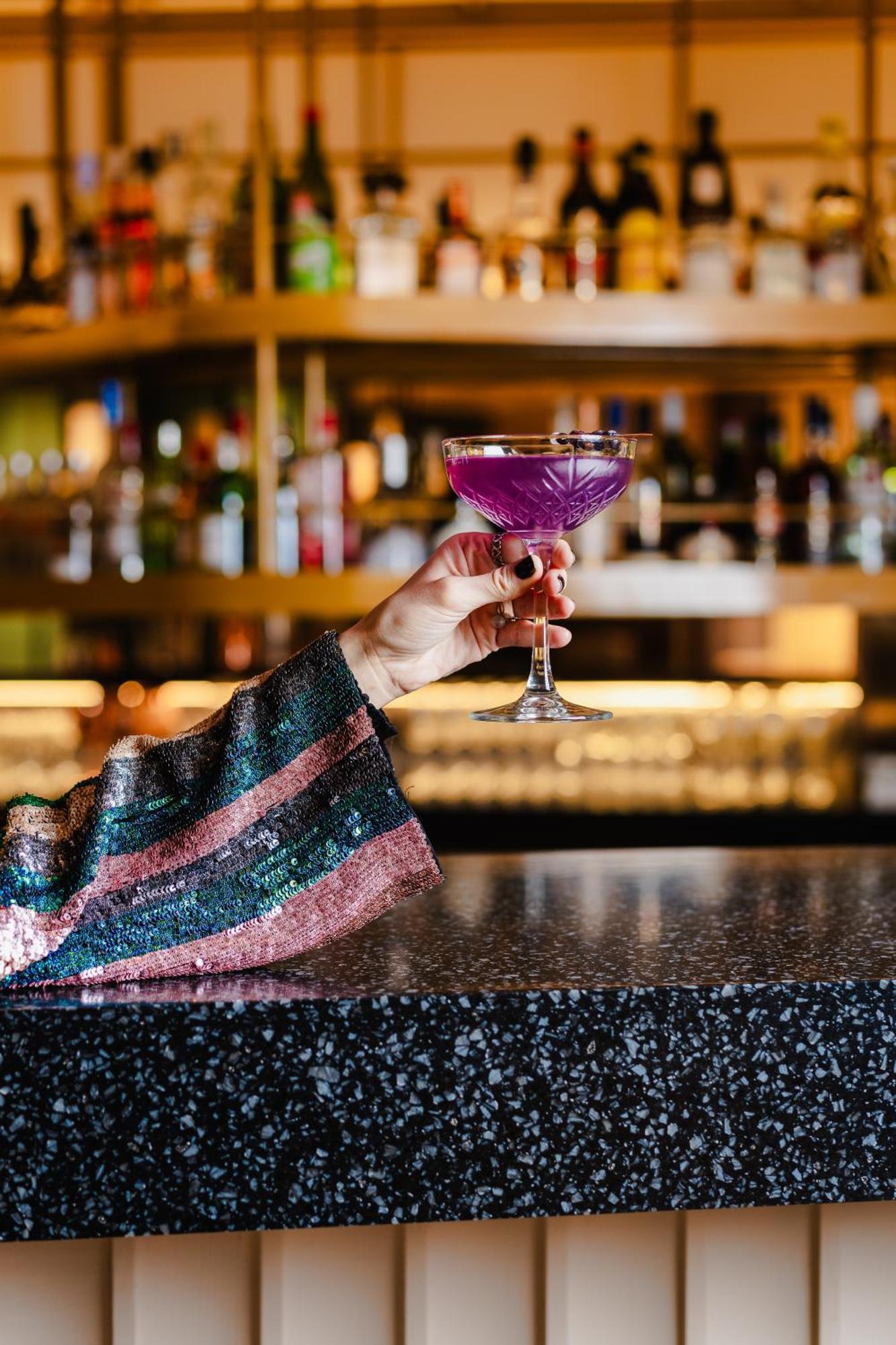 Отель Pullman Santiago El Bosque Экстерьер фото A purple cocktail